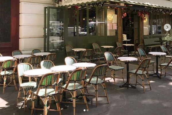 An italian restaurant with a flowery terrace A terrace in the colours of nature