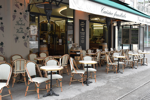 Typical parisian atmosphere A typical parisian terrace with its rattan chair
