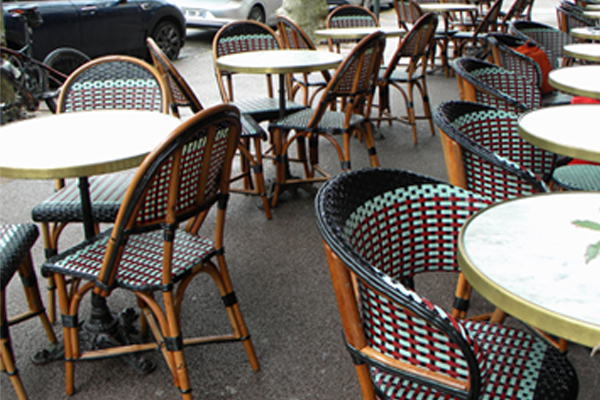 Basque bar and its pretty street terrace with natural rattan furniture Bar terrace in the heart of saint jean de luz