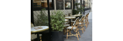 Parisan bistro and its street terrace with a natural feel A little piece of greenery on a Parisian terrace